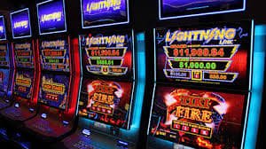 Online slot game reels displayed on a mobile screen at taya777 org